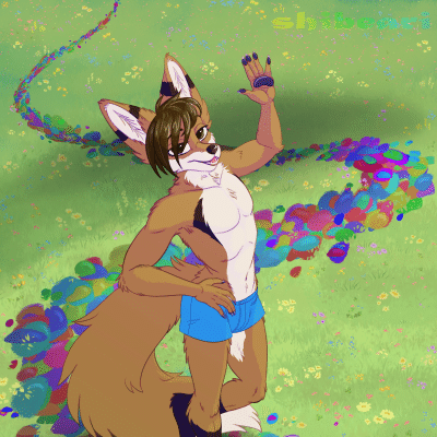 Kobaj walking along a rainbow colored footpath and waving at the camera.